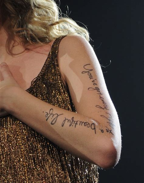 taylor swift writing on arm